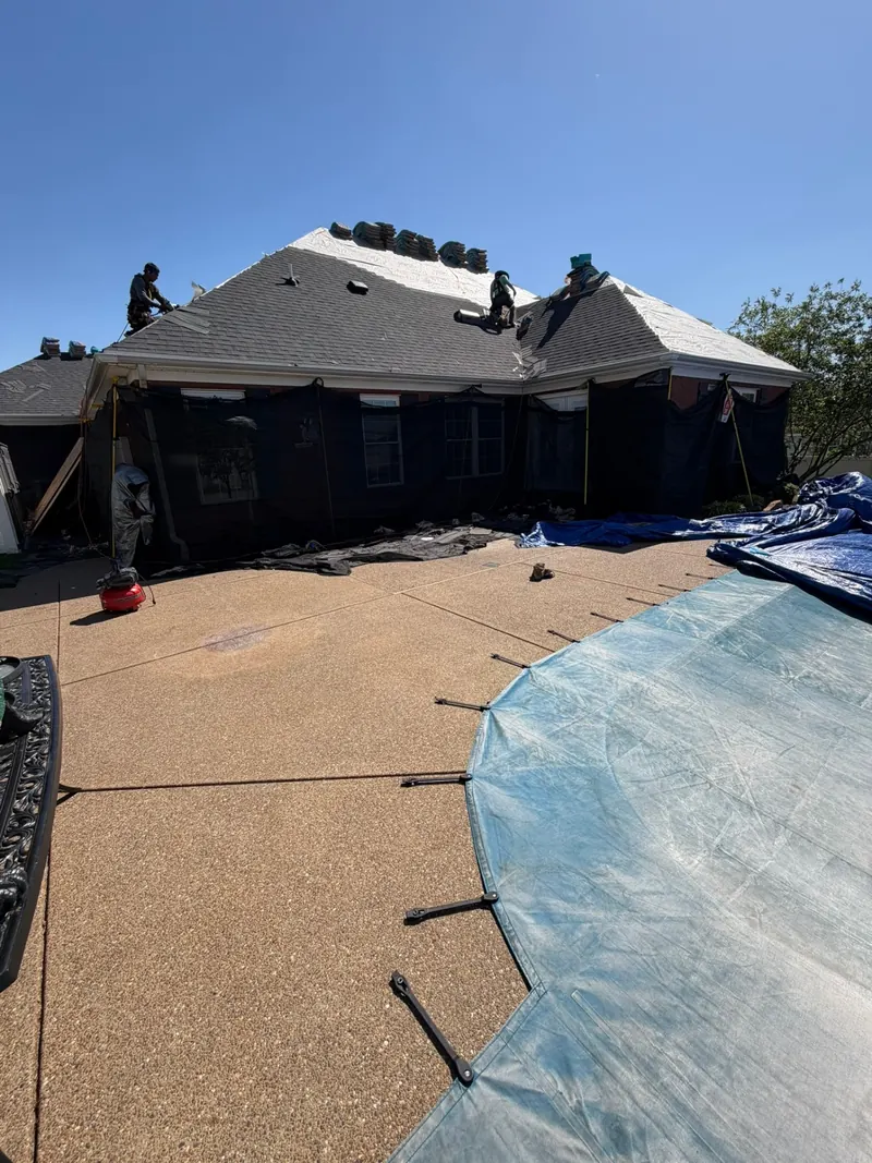 HomeVenture roof replacement with the old roofing removed for deck inspection